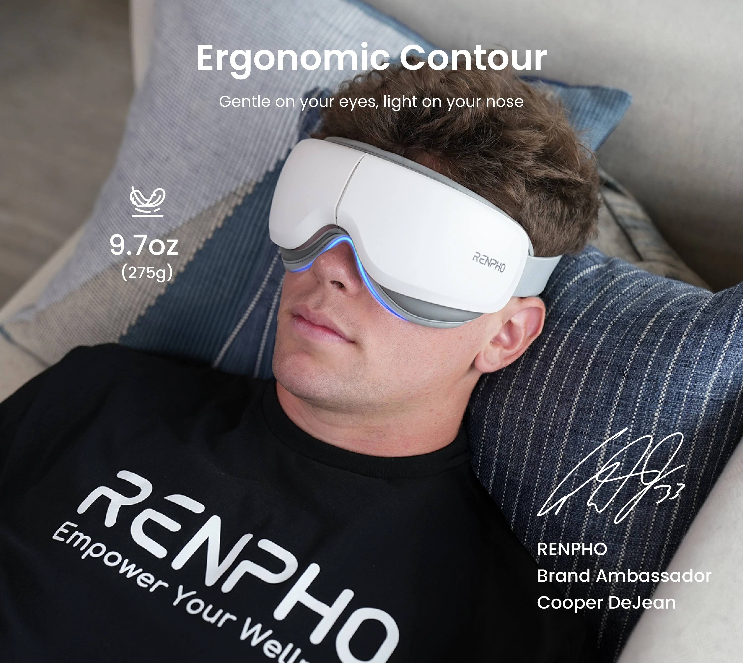 Un téléphone mis en veille à côté d'un masseur oculaire